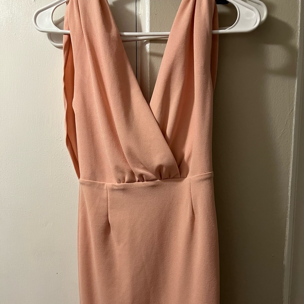 Deep-cut, light pink dress
